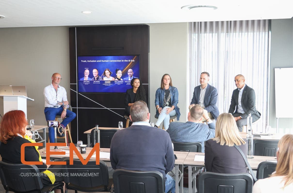 Andy Jarvis on a conference panel with the audience in view